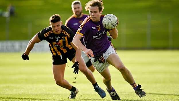 Oisín Martin, Wolfe Tones, in action against Gavin McCoy of St Peter's Dunboyne in the Meath SFC Final.